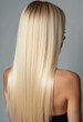 © Julija - Smooth, straight blond hair flows elegantly down back, highlighting its healthy shine and uniform color, illuminated by soft lighting, creating striking look. Hair care, the effect of cosmetics. AI