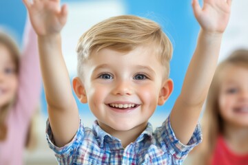 Sticker - A young boy is smiling and holding his hands up in the air