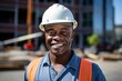 © Baba Images - Smiling portrait of a middle aged businessman on construction site