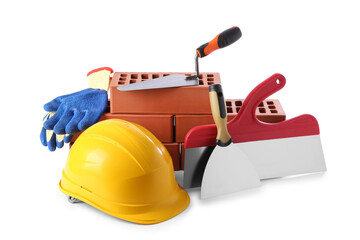 Poster - Yellow hard hat, red bricks, gloves, trowel and putty knives isolated on white. Building material and construction tools