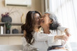 © Art_Photo - Portrait of enjoy happy love asian family senior mature mother and young daughter smiling play laughing and having fun together at home, care, elderly, insurance.happy family and Mother Day concept