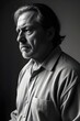 © freelanceartist - a middle-aged prisoner man with a furrowed brow and a weary expression. dishevelled, crime, criminal, arrest. jail, jail cell, prison,  incarceration, convict, punishment, confinement, sadness