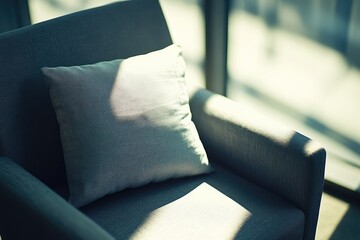 Cozy cushion on sofa bathed in warm natural sunlight indoors