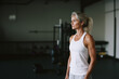 © Rapid Stock - Portrait of a healthy Old Woman with a gym background on a bright sunny day, fitness concept copy space, Senior workout lifestyle