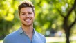 © gundo850 - Smiling man in park with green background