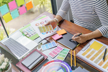 Teamwork brainstorming Creative idea Business project. Business People meeting taking notes while discussing with Color swatch samples to share idea