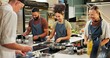© CineLens2024/peopleimages.com - Cooking, course and chef in kitchen with group for meal preparation, teaching gourmet recipe or learning skills. Culinary class, people and mentor with lesson on food education and cuisine knowledge