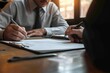 © useful pictures - Solicitor discussing insurance contract details with a client during a meeting in a calm office environment