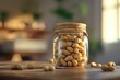 © Vii - A jar filled with peanuts sits on a wooden table, ready for snacking or serving