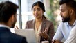 © N7 - Indian Woman Explaining Project Goals to Colleagues