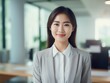© Human AI - Portrait Attractive Asian young confident business woman in business professional working office