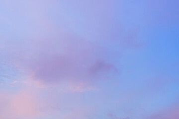 twilight sky with effect of light in pastel pink, coral, orange, blue tones. colorful sunset of soft