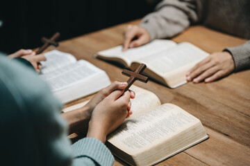 Christians are congregants join hands to pray and seek the blessings of God.