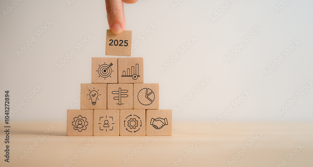 Business planning, new year plan in 2025. Wooden blocks with icons ...