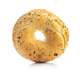 Canvas Print - Bagel sprinkled with fried onion, sesame and poppy seeds isolated on white background.