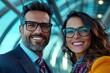 © DachAI - A professional couple with glasses smiles warmly, set against a futuristic background, symbolizing modernity, positive relationships, and professional success.