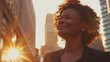 © David Kreuzberg - happy black businesswoman with urban background