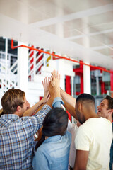 Wall Mural - Business, employees and smile with high five at office for team building, collaboration and support for project. People, diversity and happy in startup company with synergy or huddle for coworking