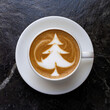 © totojang1977 - Top view of Latte arts coffe. White cup of hot coffee with pine tree Latte art on top. Cafe with barista art concept.