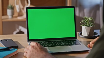 Wall Mural - Professional hand tapping chromakey computer button at agency office closeup