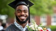 © tuiphotoengineer - Overjoyed graduate student standing outside their school holding a diploma and flowers in of their academic achievement and success