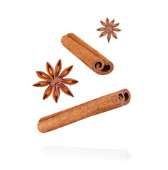 Canvas Print - Star anise and cinnamon sticks isolated on white background. Aromatic spice for cooking and baking. Seasoning for autumn and winter holiday recipes.