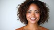 © tuiphotoengineer - Energetic and Joyful African American Female with Curly Hair Smiling Casually Against a White Backdrop Exuding Confidence and Vibrant Personality