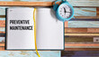 © Sviatlana - The concept of the preventive maintenance text, written in a notebook, next to the clock
