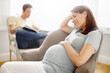 © peopleimages.com - Pregnant woman, thinking and rest in relax, happiness or comfort for baby development in family home. People, waiting and chair in motherhood as parents with growth for break, peace and calm in house