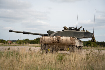 close-up of a Challenger 2 II FV4034 main battle tank, gun aimed to the side