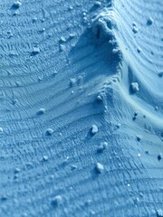 Sandy surface with a blue corrugated texture features a copy space image glitter dust particle Ultra realistic 