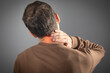 © andranik123 - Caucasian man suffering from neck pain.
