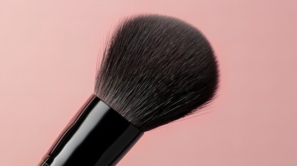 close-up of a black makeup brush with soft bristles