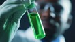 © Shutter2U - A laboratory a scientist in a white coat and goggles, holding a test tube with vibrant green liquid, symbolizing research and innovation. Ideal for educational and promotional use.