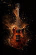 © Vilma - A stunning electric guitar is showcased against a black background, surrounded by an explosion of golden particles and debris, creating a dynamic and artistic effect. The guitar features a rich wood
