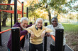 © Marko Geber - Senior male friends working out at outdoor exercise park
