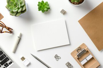 Top View of White Card Mockup with Workspace Accessories