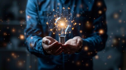 A man in a blue shirt holds a creative light bulb with lines and dots, symbolizing innovation against a dark background.