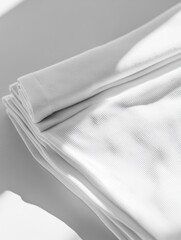 Aufkleber - Neatly arranged minimalist sportswear on a smooth table showcases a tidy and modern aesthetic in a well-lit environment. Generative AI