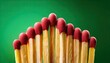 © LipskiyS - Matches on a green background close up