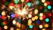 © Nuttaya Nampai - Sparkler Glow Against Blurred Colorful Background
