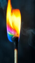 Wall Mural - captivating rainbow flames dancing on a matchstick