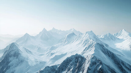 Wall Mural - Snow covered mountain peaks reaching for the sky in a cold, crisp winter landscape on a clear day