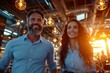 © DKPhoto - Two smiling professionals walk together in a modern office space filled with warm lighting, symbolizing success, collaboration, and a positive work environment.