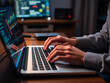 © Vectplus - hands typing on a laptop computer, with hands positioned on the keyboard