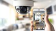 © Pannin - A close-up of a wireless CCTV camera installed in a smart home, integrated with mobile phone technology for real-time monitoring.
