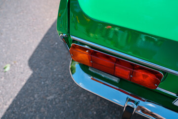 Shiny body parts of a Soviet retro car. Saint Petersburg, Russia - 15 Aug 2024