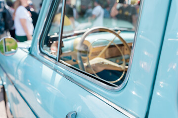 Shiny body parts of a Soviet retro car. Saint Petersburg, Russia - 15 Aug 2024