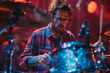 © Narsha - A focused drummer in glasses and a plaid shirt plays on stage under red lighting, Generative AI