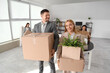 © Pixel-Shot - Business people with boxes in office on moving day